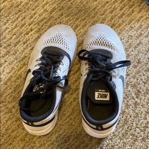 Grey and black nike sneakers